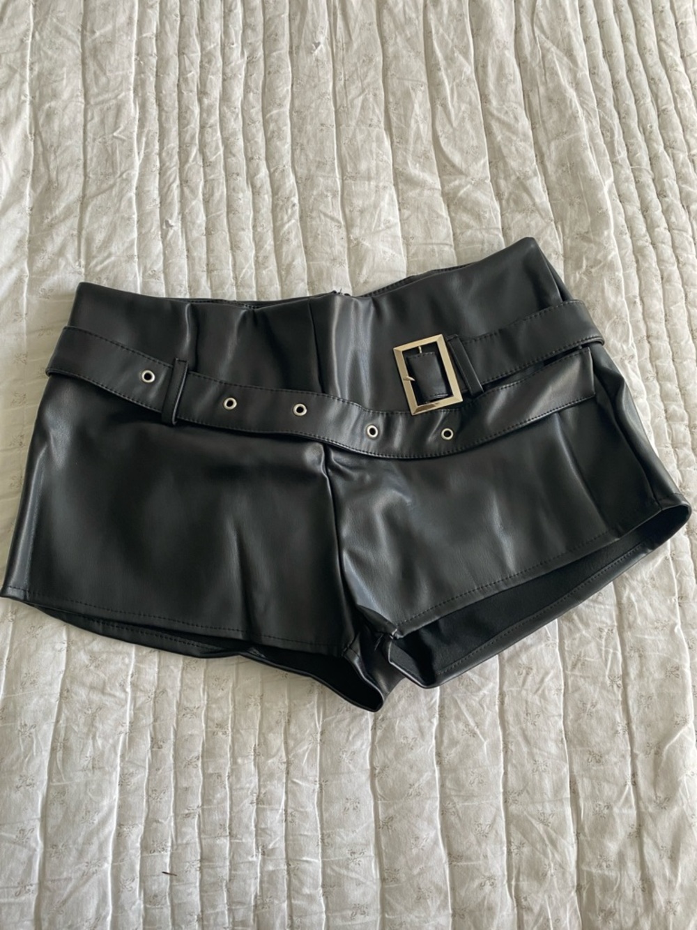 Black faux leather shorts